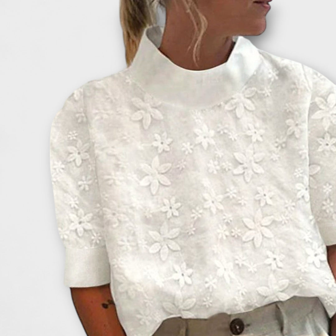 Blus Doutzen med broderad enkel ståkrage